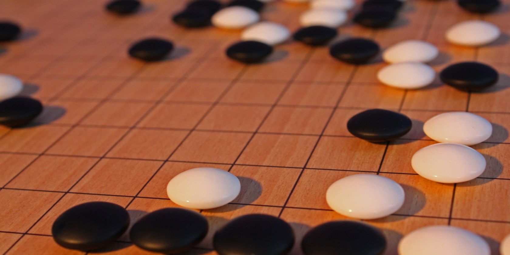 Brettspiel mit schwarzen und weißen Steinen, © Pixaby Brettspiel mit schwarzen und weißen Steinen, © Pixaby