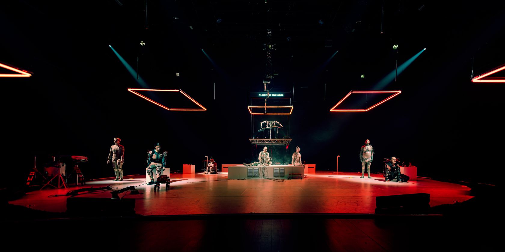 Part of the performance Eternal Dawn, showing performers in robot-like costumes on stage., &copy; Festival Musica &copy; Tha&iuml;s Breton