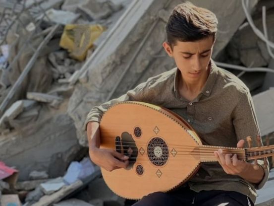 Samih Al-Madhoun finds hope in continuing to sing amid the rubble in Gaza., &copy; Courtesy of Samih Al-Madhoun
